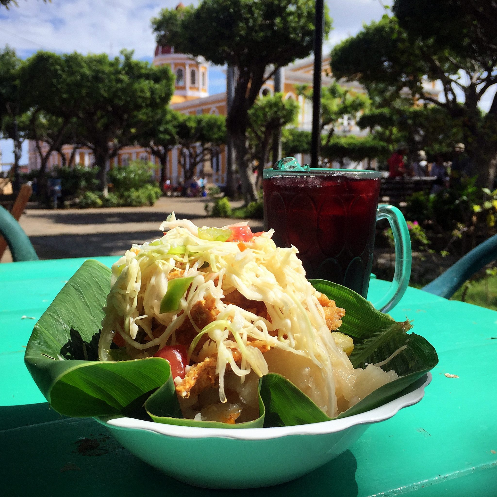 vigoron and agua de jamaica, a plate of food in granada nicaragua