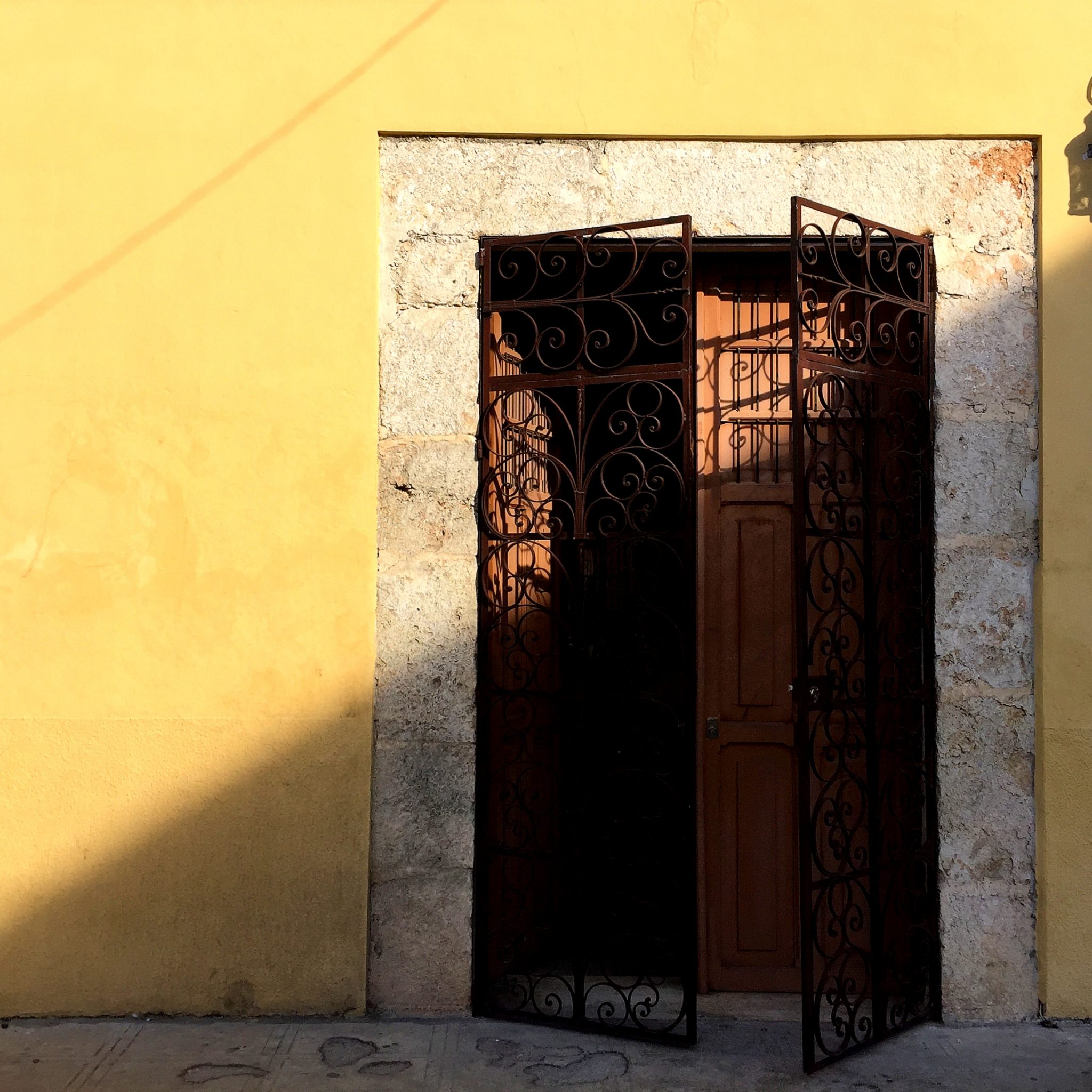 The city is dotted with colonial homes transformed into cozy hotels, often hidden behind massive doors and iron gates.